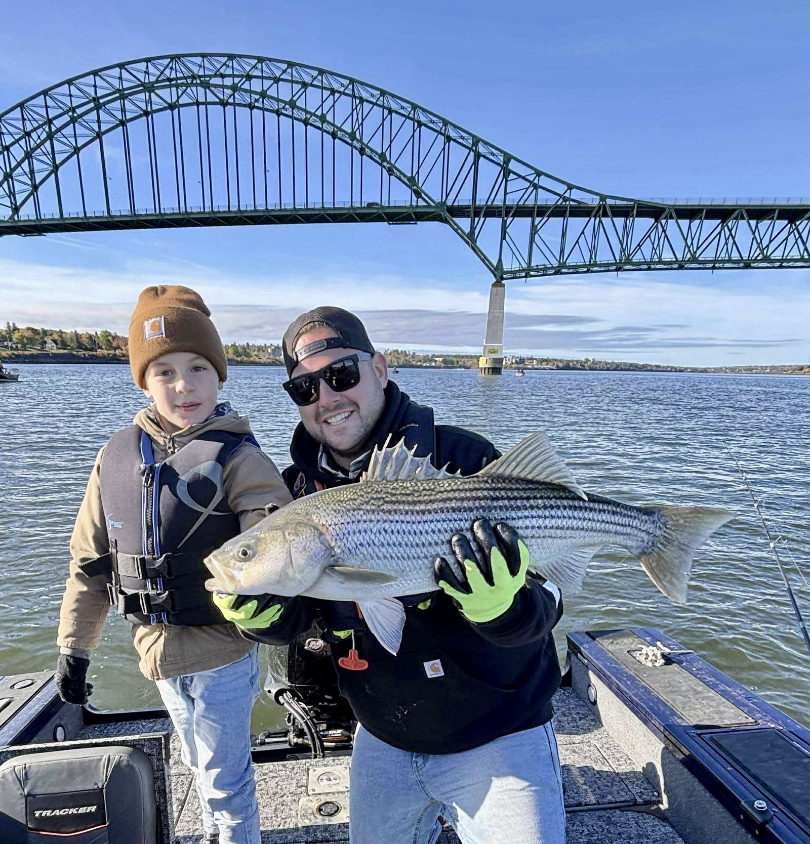Angler with fall striped bass